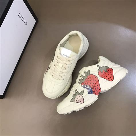 gucci rhyton strawberry sneakers.